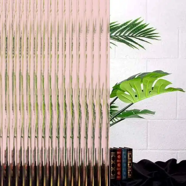 Light pink coloured reeded film covering a plant.
