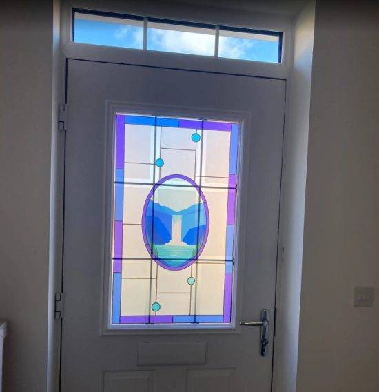 Ingrid Stained Glass Window Film installed onto a front door