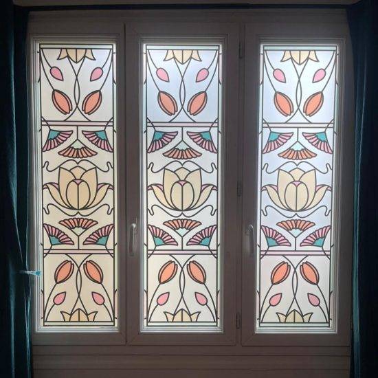 Tatia window film installed on multiple portrait sized windows.