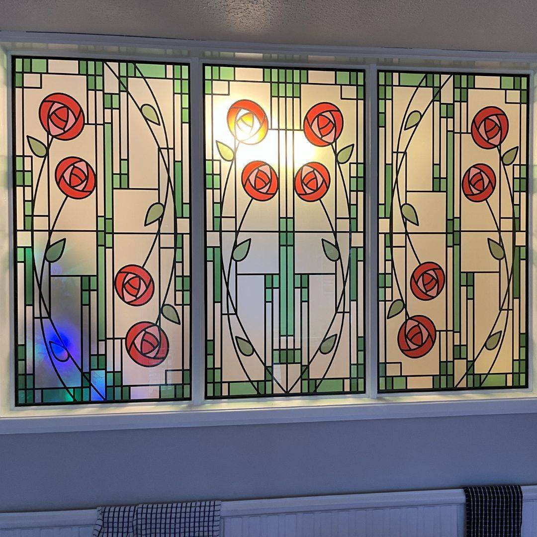 Yoko rose stained glass design on four window panels.