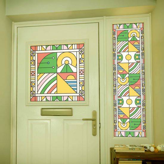 bright colourful stained glass window film pattern installed onto a door and window