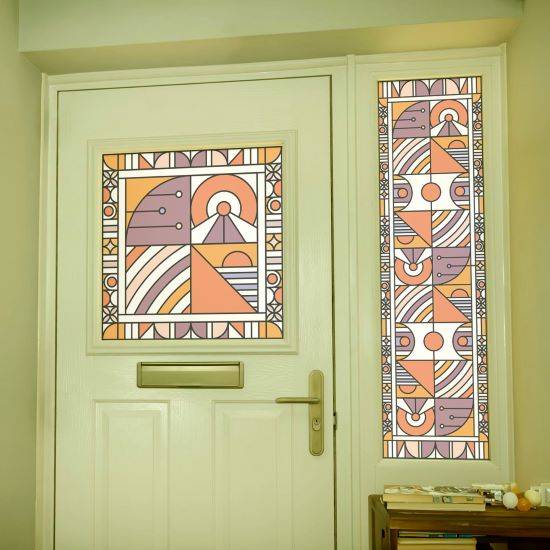 purple stained glass window film with orange installed onto a door and window