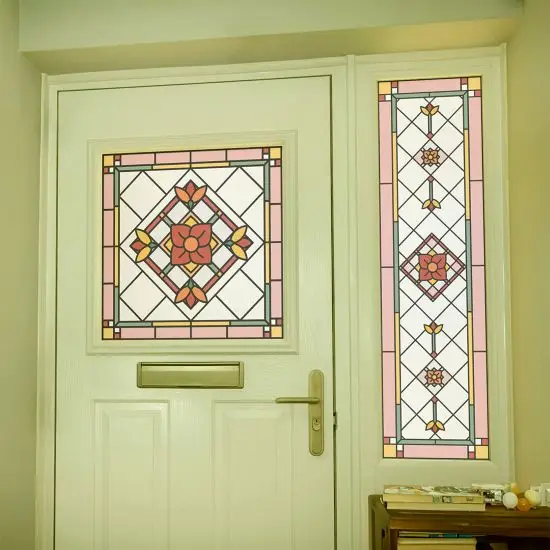 traditional stained glass window film with an vintage red flower on a pink border