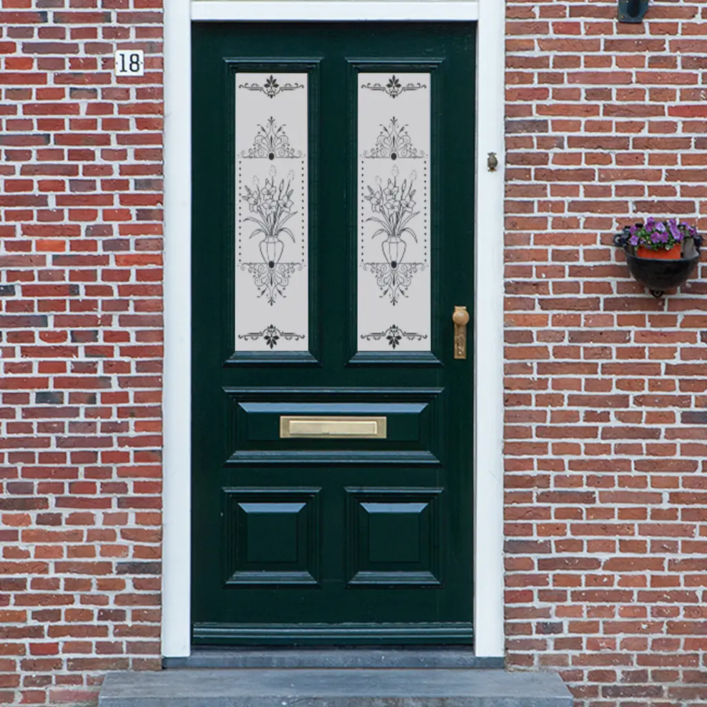 A floral Victorian frosted glass door window film with a flower pot in the central surrounded by a simple traditional border installed onto a front door.