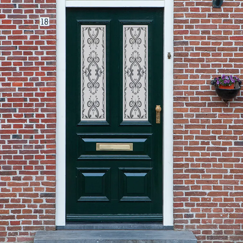 A Victorian frosted glass window film design with a flower pattern on a front door